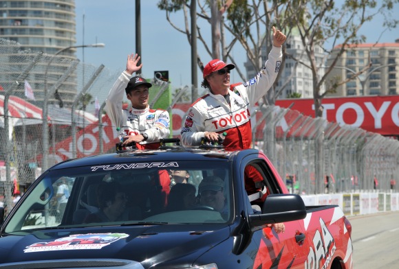 Japanese professional driver and drifter Ken Gushi and actor William  Fichtner celebrate their victories with a